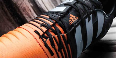 adidas schuh schwarz mit oranger sohle|Orange Sneaker .